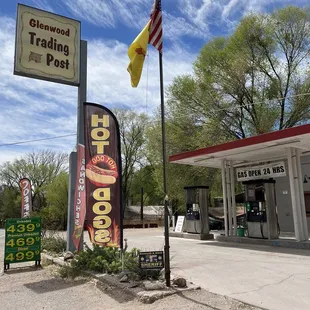 a gas station with an american flag