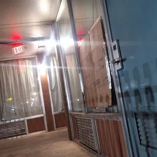 CARDBoarded up broken window