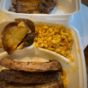 Combo #2: 3 spare ribs, 2 side orders (seasoned potato wedges and homemade mac and cheese), and drink.
