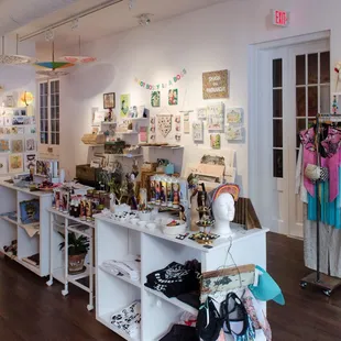 A view of the space! Art &amp; t shirts, pins &amp; jewelry, postcards &amp; candles!!!