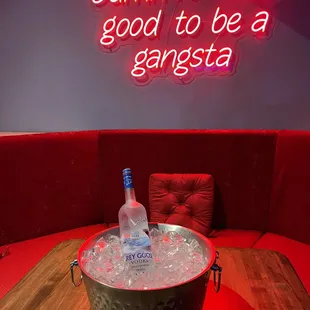 a bucket of ice and a bottle of vodka