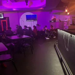 a group of people sitting at tables