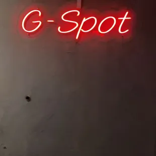 a neon sign that says g - spot