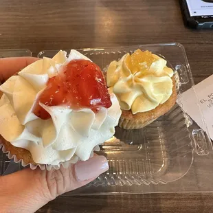 Strawberry and a pineapple cupcake