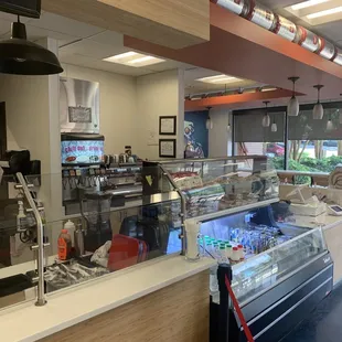 a view of the counter area of a restaurant