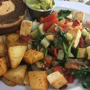Marks scramble with rye toast and avocado on the side