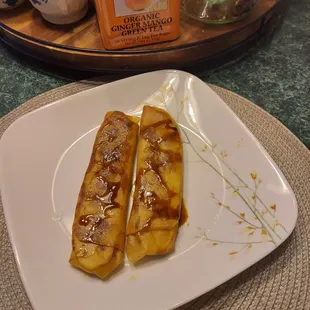 Fried banana turon dessert is a banana wrappwdvwith springroll wrapper and deep fried then caramelized sugar as topping