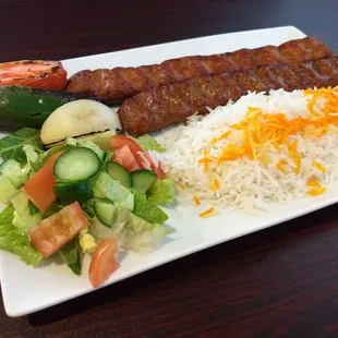 Mix Koobideh kabob.(1 chicken, 1 beef) Basmati rice, salad, grilled tomato, onion, and Jalapeño. Very tasty, everything was good.
