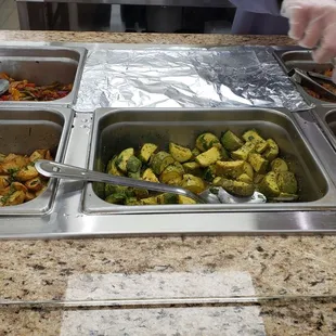 a buffet with a variety of food items