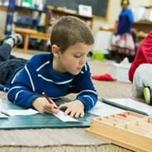 Our children choose where they learn and it doesn't have to be on a desk!