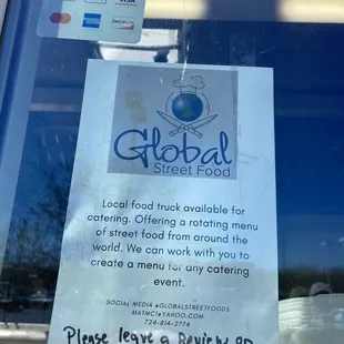 a sign on the window of a restaurant