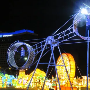 Two acrobats work these two circles.