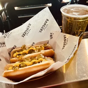 Dollar Hot Dogs!  They get you on the beer, though.