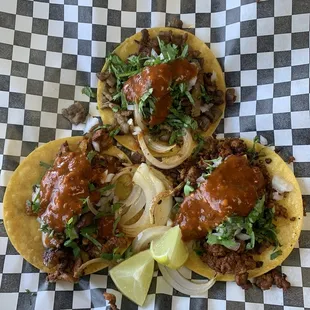 [top, left, right] Carne asada, al pastor, chorizo tacos