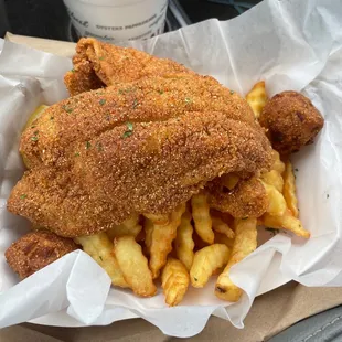 Fresh fried catfish fries and hushpuppies absolutely amazing