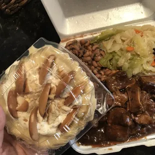 Oxtail, black eyed peas, cabbage and banana pudding. So good!