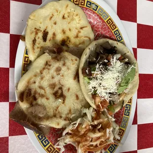 Two pupusas and a tongue taco.