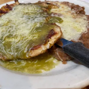 Chicken breast with green salsa and melted cheese, delicious!