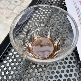 a glass of beer on a table