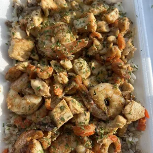 a plate of chicken and rice