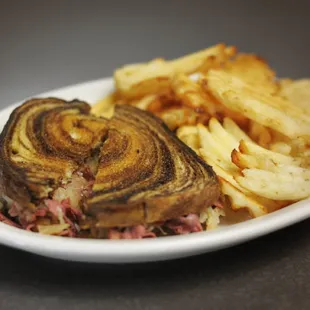 a classic Rueben Sandwich and waffle fries