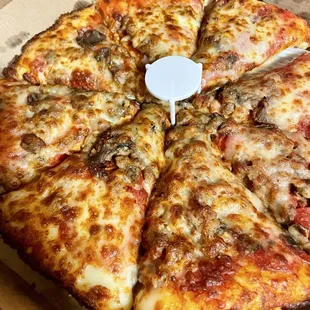 Make your own-medium, beef, sausage, and mushrooms