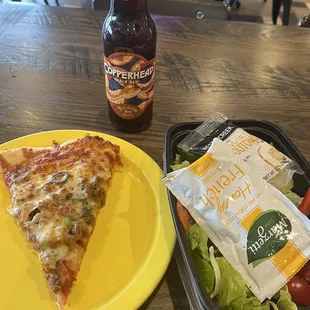 Lunch special pizza salad and a good free state beer