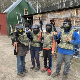 Four 12 year olds after a fun day at Glory Road Paintball.
