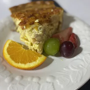 a slice of cake and fruit