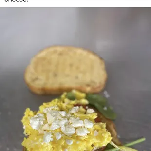 a sandwich with eggs and spinach