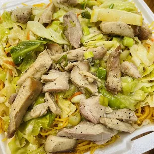 a chicken salad in a styrofoam container