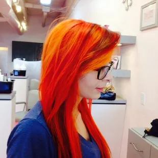 Vibrant cool orange and red tones done by Denise Santos