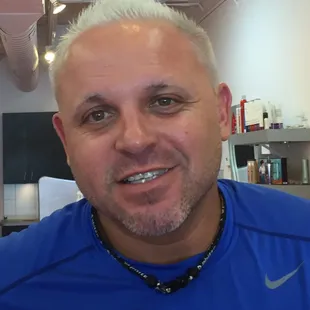 White blonde hair called Chrome.  Hair cut and colored by Denise Santos