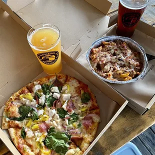 Enjoying pizza and beer at the brewery