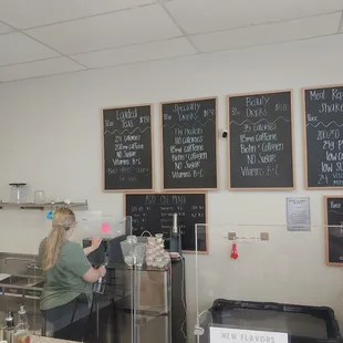 a woman preparing food in a kitchen