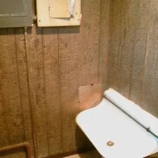 Note the classic trough urinal