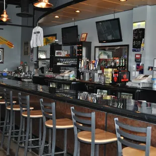 a bar with bar stools
