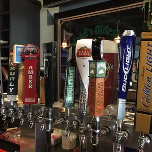 a row of beer taps