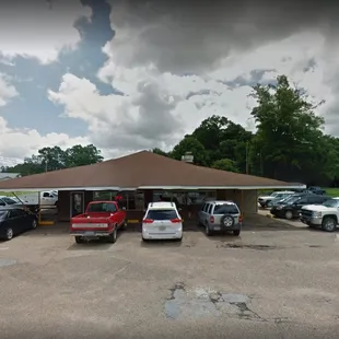 a parking lot with cars parked in it