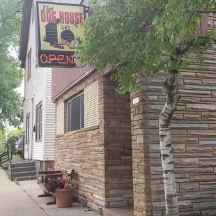 a brick building with a sign on the front