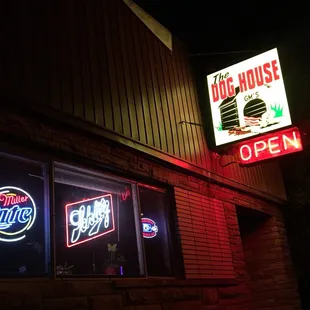 a neon sign in the window
