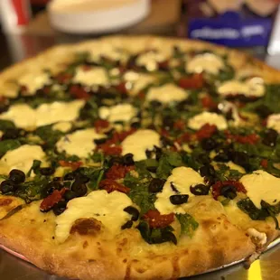 Popeye &amp; Olive pizza Spinach, Olives, Sundried Tomatoes, and Ricotta cheese Absolutely amazing!!