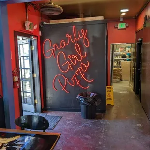 a neon sign in a restaurant