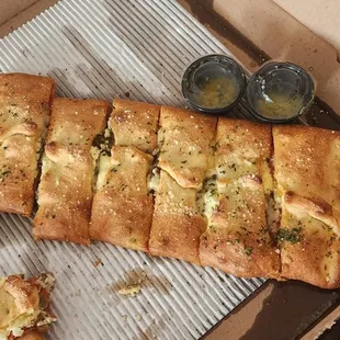 This cold and unimpressive Stromboli cost $32 and I had to wait an hour.