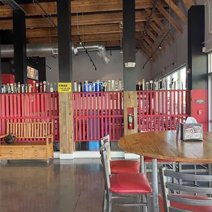 Beer tap art on red wall