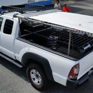 Load Warrior on top of WhispBar rack on cab and Mega Warrior with Extension on Yakima Bedrock over bed.