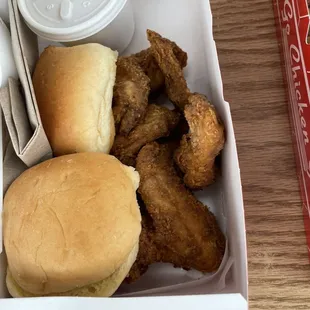 ows a box of fried chicken and a sandwich