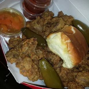 Full order of Gizzards with spicy carrots and peppers for the win, ,the best in the City