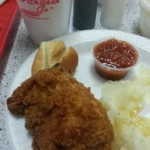 Chicken breast, mashed potatoes and chicken gravy, roll and of course the G-Sauce.