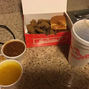 Chicken livers and gizzards mix with sweet tea and baked beans gravy in the side